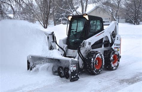 snow skid steer|skid steer vs bobcat.